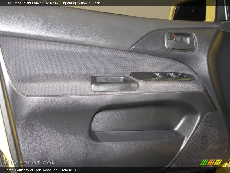 Lightning Yellow / Black 2002 Mitsubishi Lancer OZ Rally