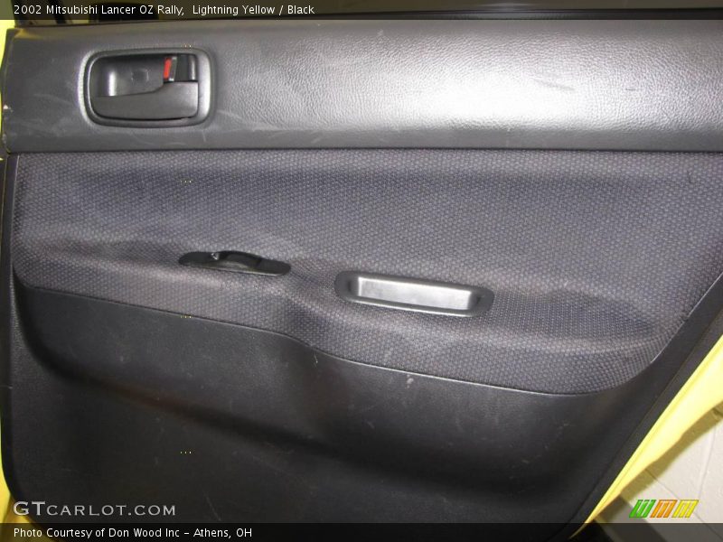 Lightning Yellow / Black 2002 Mitsubishi Lancer OZ Rally