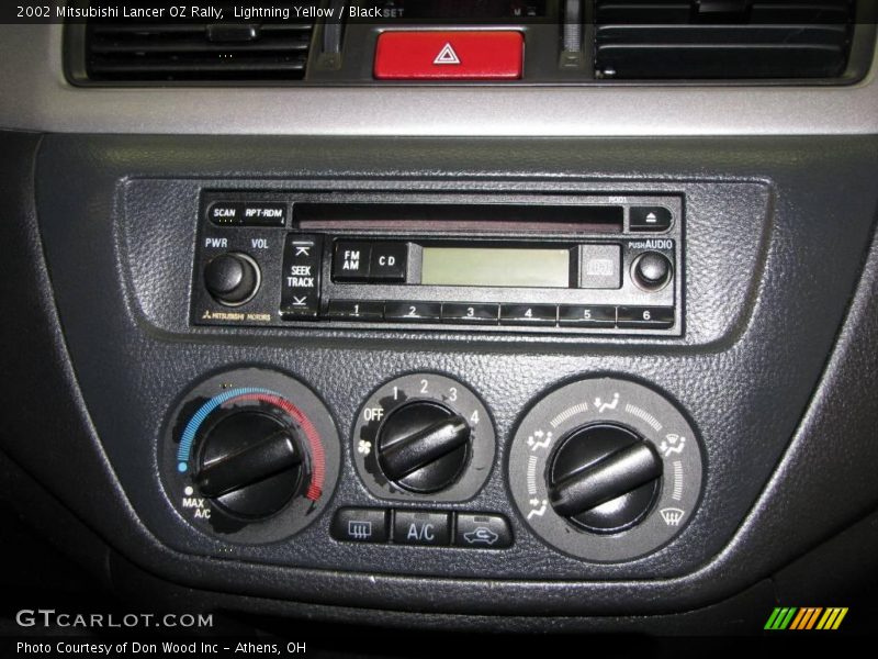 Lightning Yellow / Black 2002 Mitsubishi Lancer OZ Rally