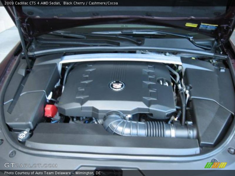 Black Cherry / Cashmere/Cocoa 2009 Cadillac CTS 4 AWD Sedan