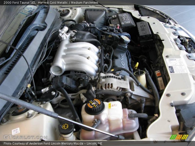 Harvest Gold Metallic / Medium Parchment 2000 Ford Taurus SES