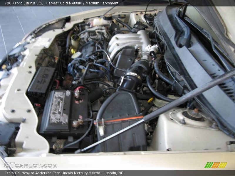 Harvest Gold Metallic / Medium Parchment 2000 Ford Taurus SES