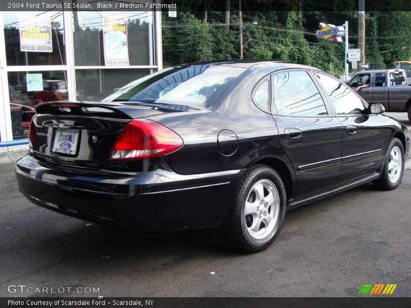 Black / Medium Parchment 2004 Ford Taurus SE Sedan