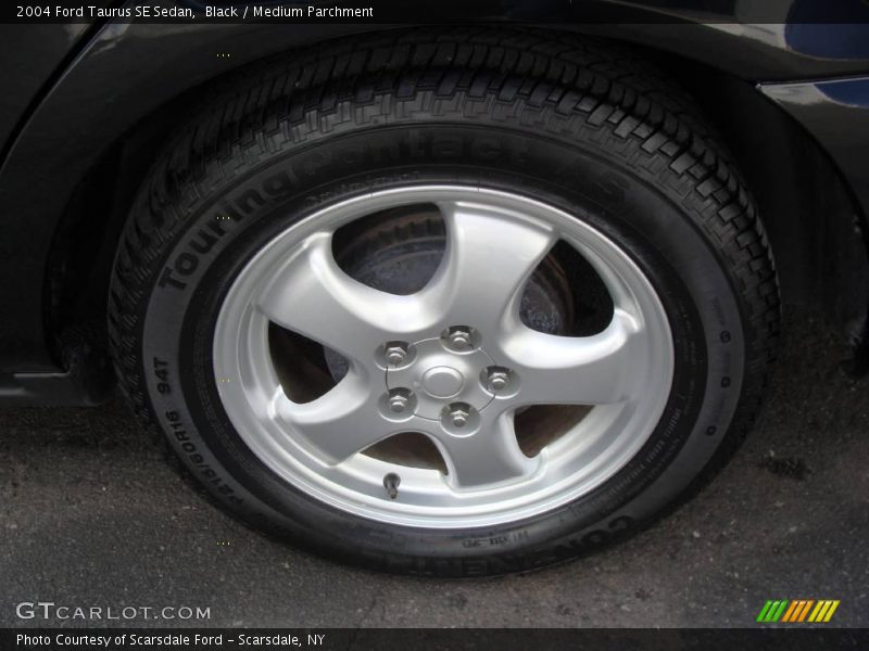 Black / Medium Parchment 2004 Ford Taurus SE Sedan