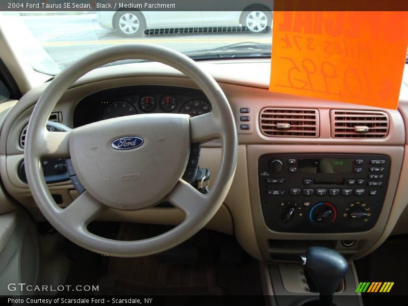 Black / Medium Parchment 2004 Ford Taurus SE Sedan