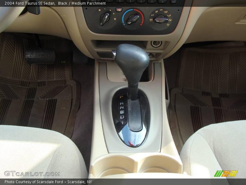 Black / Medium Parchment 2004 Ford Taurus SE Sedan
