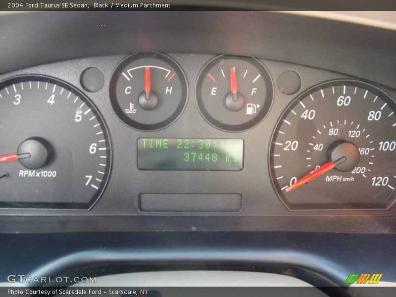 Black / Medium Parchment 2004 Ford Taurus SE Sedan