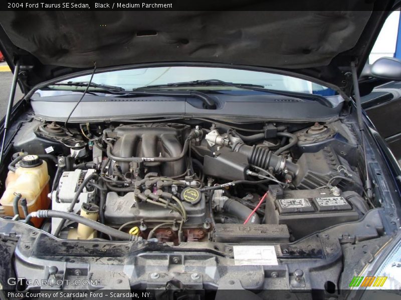 Black / Medium Parchment 2004 Ford Taurus SE Sedan