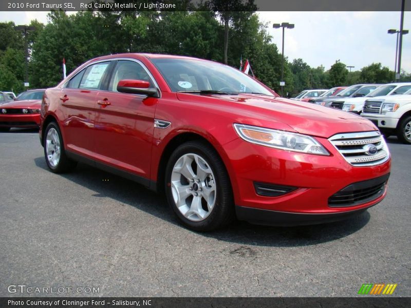Red Candy Metallic / Light Stone 2010 Ford Taurus SEL