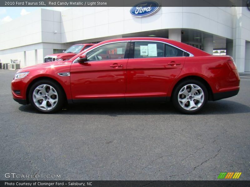 Red Candy Metallic / Light Stone 2010 Ford Taurus SEL