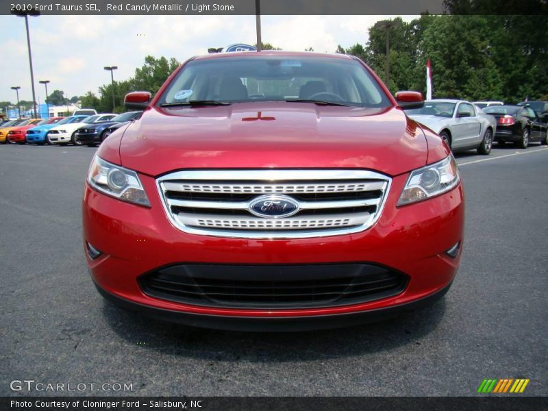Red Candy Metallic / Light Stone 2010 Ford Taurus SEL