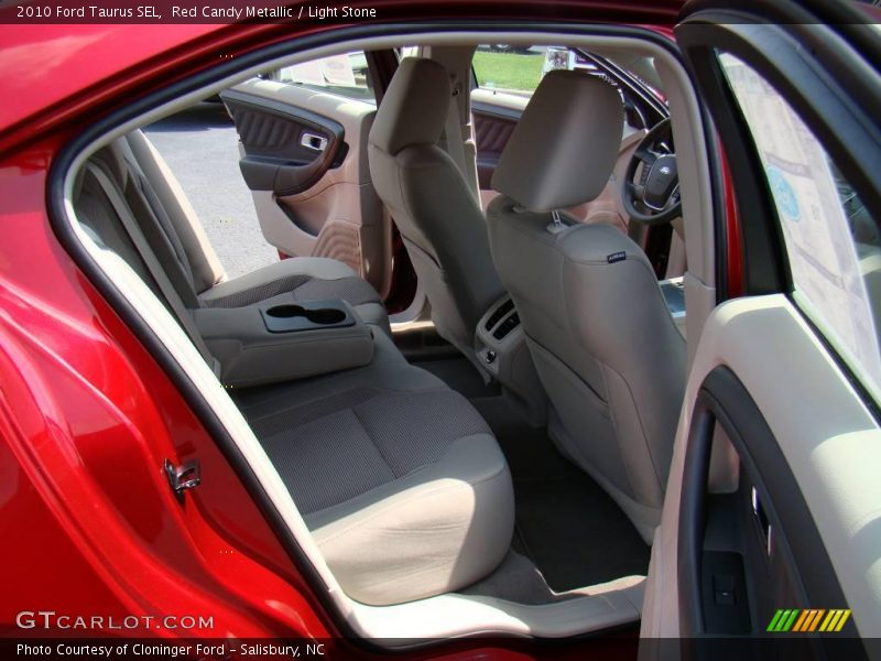 Red Candy Metallic / Light Stone 2010 Ford Taurus SEL