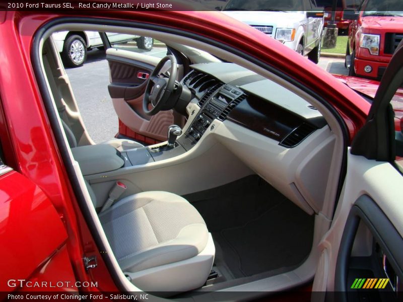 Red Candy Metallic / Light Stone 2010 Ford Taurus SEL