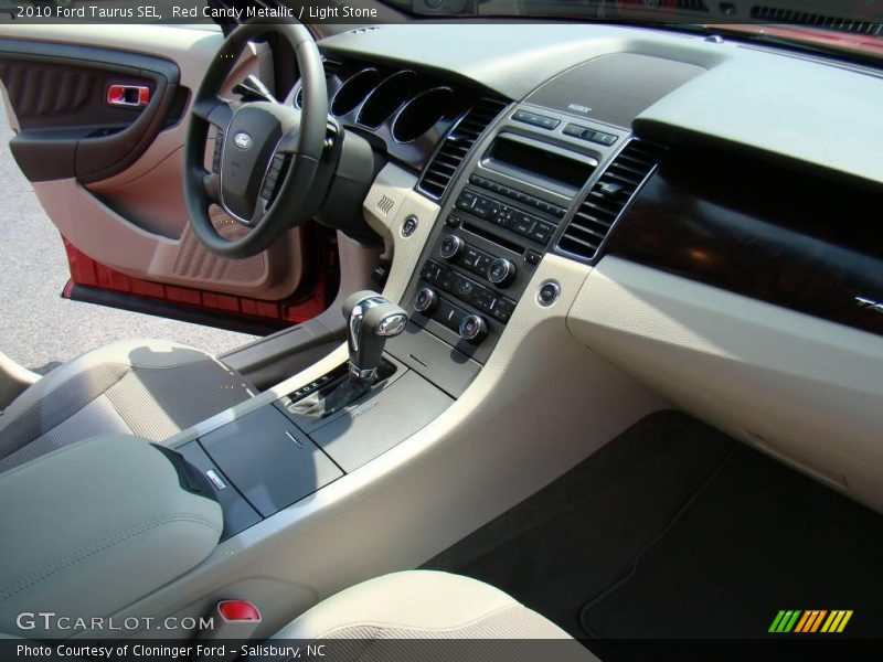 Red Candy Metallic / Light Stone 2010 Ford Taurus SEL