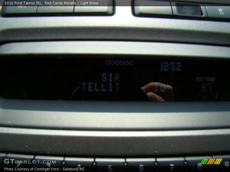 Red Candy Metallic / Light Stone 2010 Ford Taurus SEL