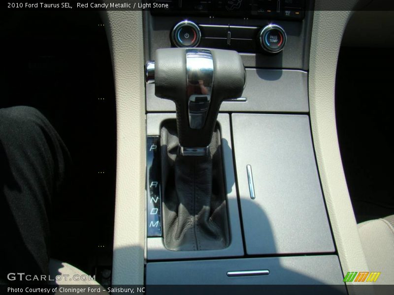 Red Candy Metallic / Light Stone 2010 Ford Taurus SEL
