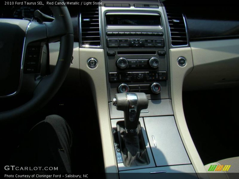 Red Candy Metallic / Light Stone 2010 Ford Taurus SEL