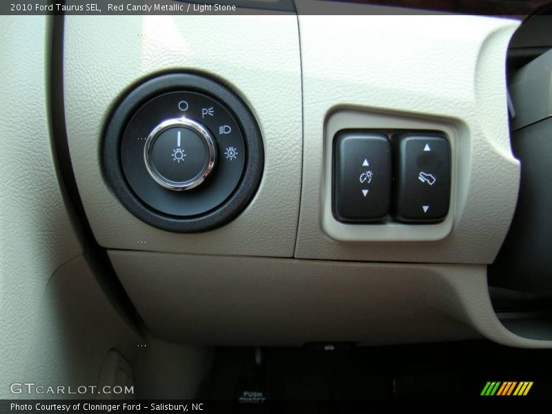 Red Candy Metallic / Light Stone 2010 Ford Taurus SEL