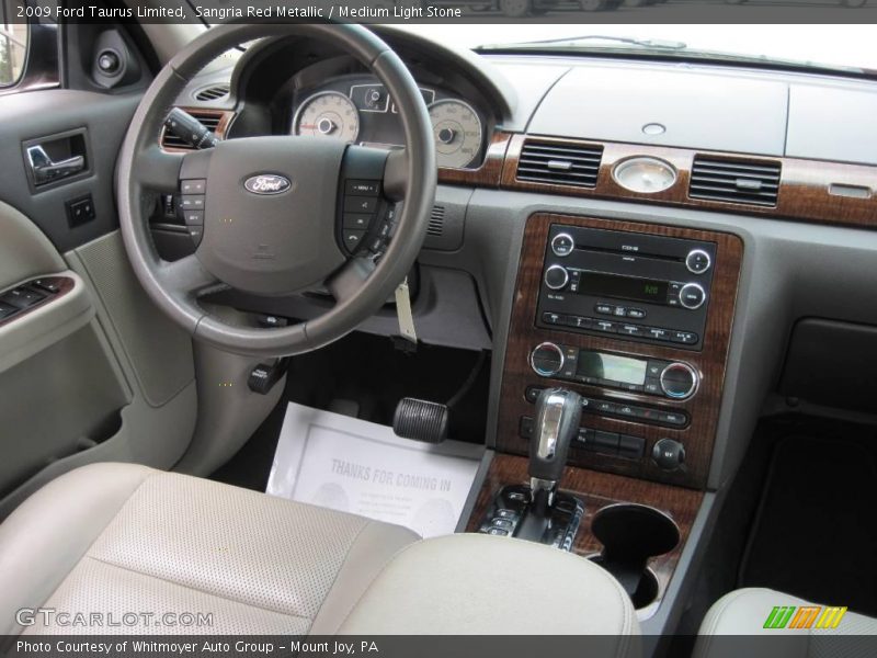 Sangria Red Metallic / Medium Light Stone 2009 Ford Taurus Limited