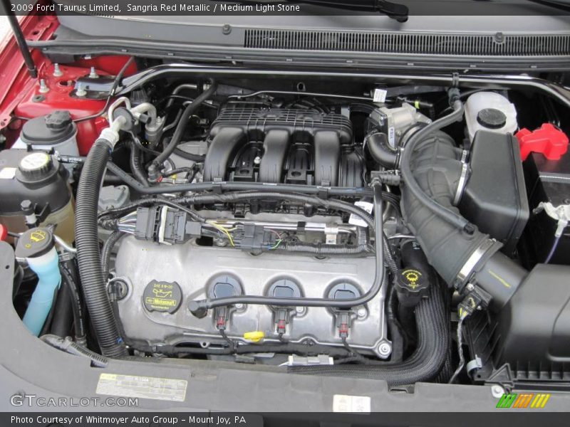 Sangria Red Metallic / Medium Light Stone 2009 Ford Taurus Limited