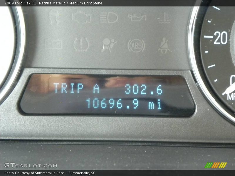 Redfire Metallic / Medium Light Stone 2009 Ford Flex SE