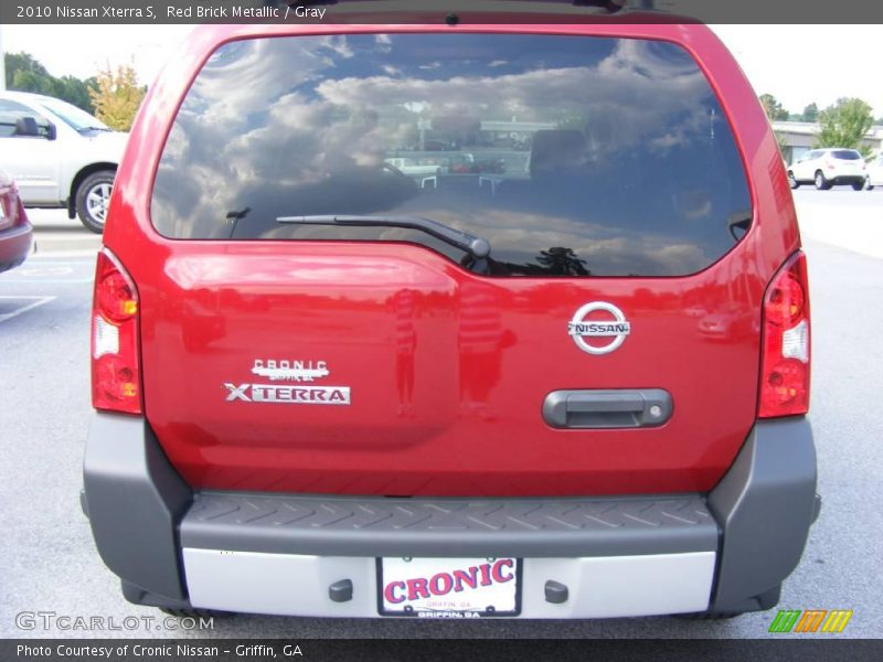 Red Brick Metallic / Gray 2010 Nissan Xterra S