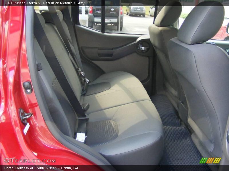 Red Brick Metallic / Gray 2010 Nissan Xterra S