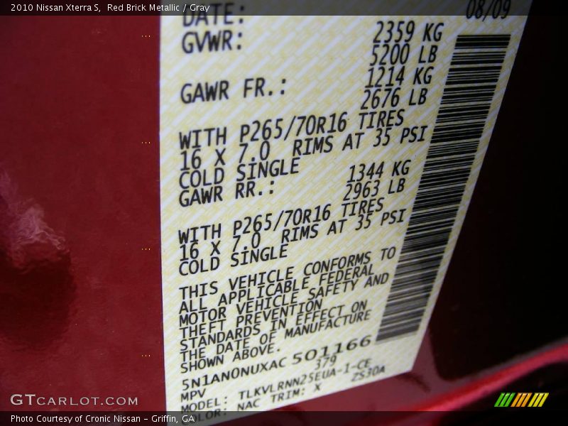 Red Brick Metallic / Gray 2010 Nissan Xterra S
