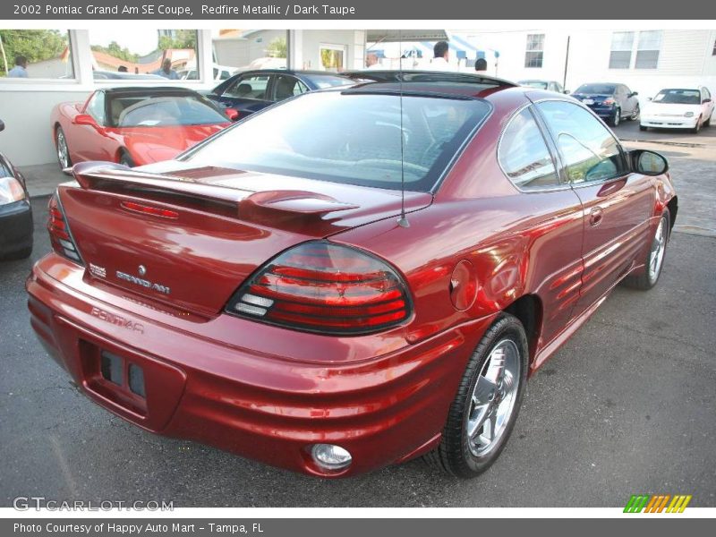 Redfire Metallic / Dark Taupe 2002 Pontiac Grand Am SE Coupe