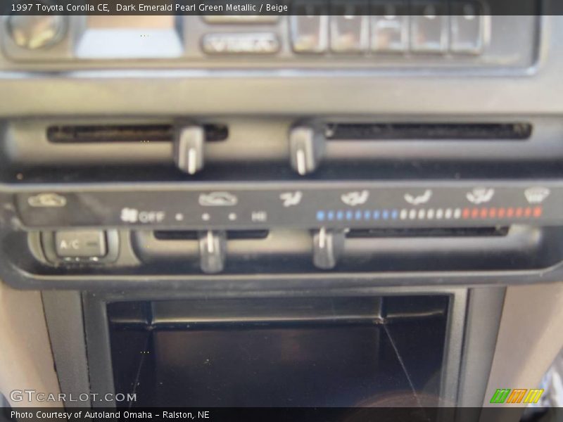 Dark Emerald Pearl Green Metallic / Beige 1997 Toyota Corolla CE