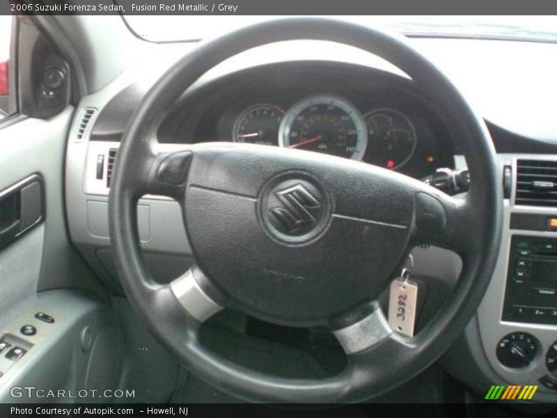 Fusion Red Metallic / Grey 2006 Suzuki Forenza Sedan