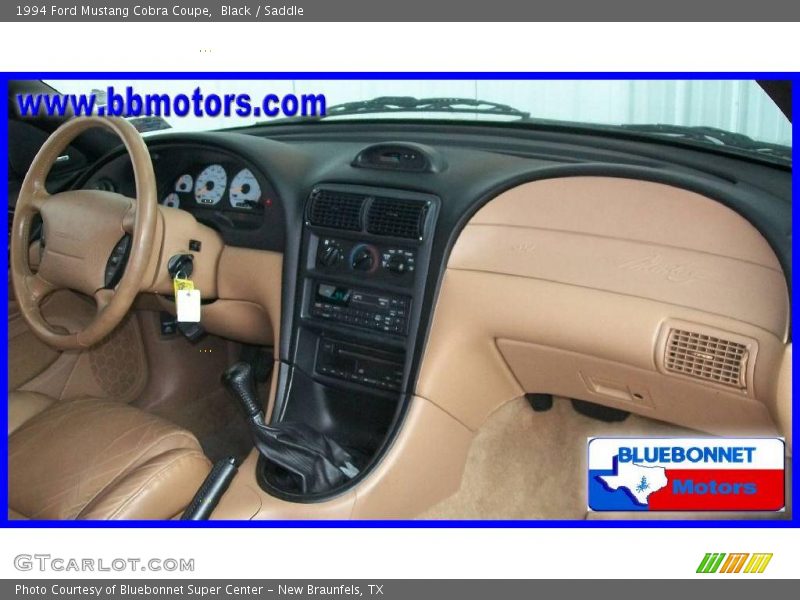 Black / Saddle 1994 Ford Mustang Cobra Coupe
