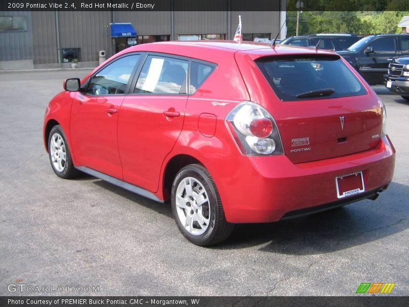 Red Hot Metallic / Ebony 2009 Pontiac Vibe 2.4
