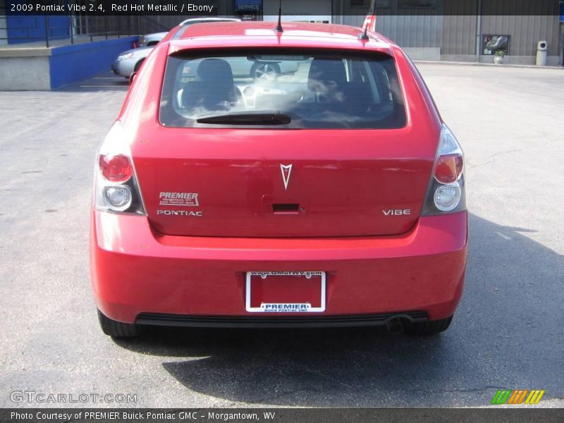 Red Hot Metallic / Ebony 2009 Pontiac Vibe 2.4