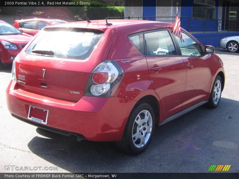 Red Hot Metallic / Ebony 2009 Pontiac Vibe 2.4