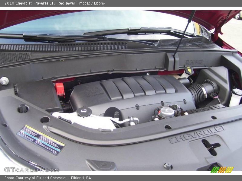 Red Jewel Tintcoat / Ebony 2010 Chevrolet Traverse LT