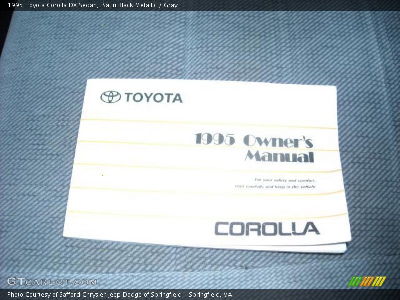 Satin Black Metallic / Gray 1995 Toyota Corolla DX Sedan