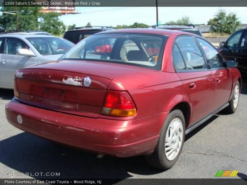 Medium Red / Gray 1999 Saturn S Series SL2 Sedan
