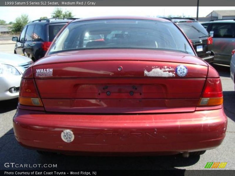 Medium Red / Gray 1999 Saturn S Series SL2 Sedan