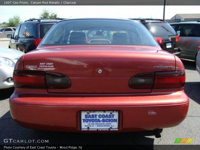 Canyon Red Metallic / Charcoal 1997 Geo Prizm