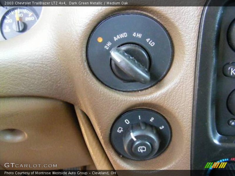 Dark Green Metallic / Medium Oak 2003 Chevrolet TrailBlazer LTZ 4x4