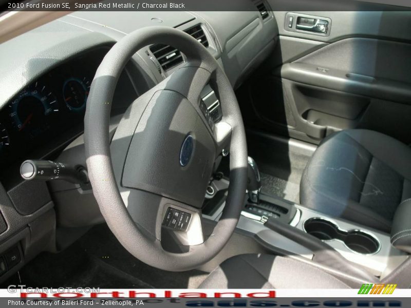 Sangria Red Metallic / Charcoal Black 2010 Ford Fusion SE