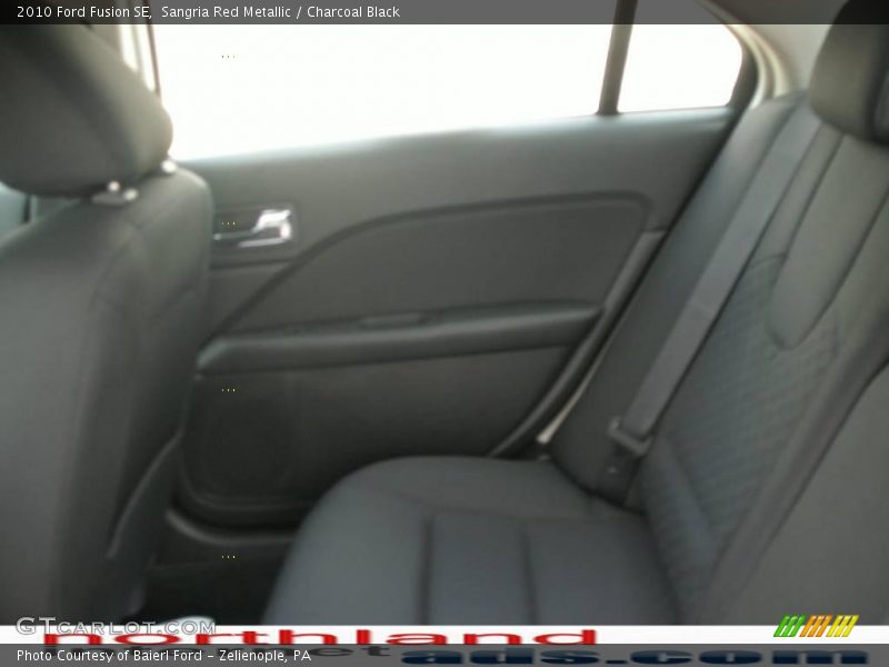 Sangria Red Metallic / Charcoal Black 2010 Ford Fusion SE