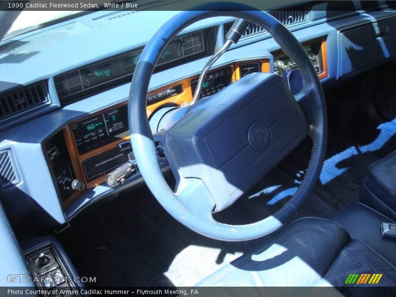 White / Blue 1990 Cadillac Fleetwood Sedan