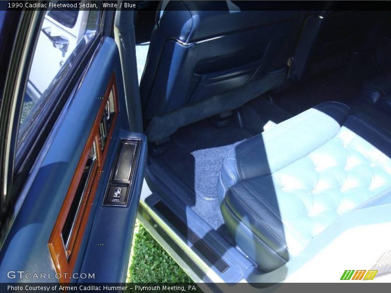 White / Blue 1990 Cadillac Fleetwood Sedan