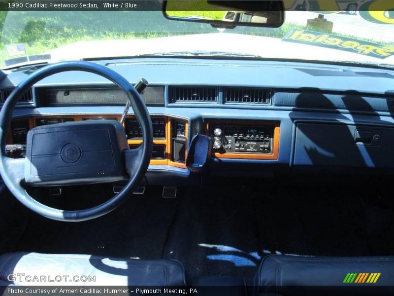 White / Blue 1990 Cadillac Fleetwood Sedan