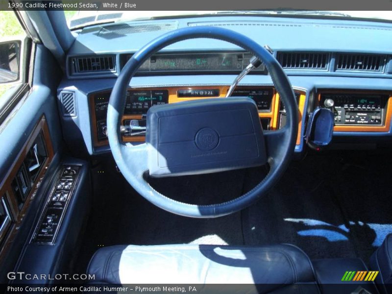White / Blue 1990 Cadillac Fleetwood Sedan