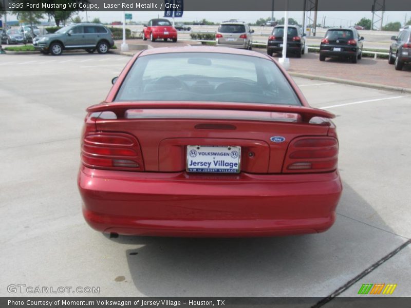 Laser Red Metallic / Gray 1995 Ford Mustang V6 Coupe