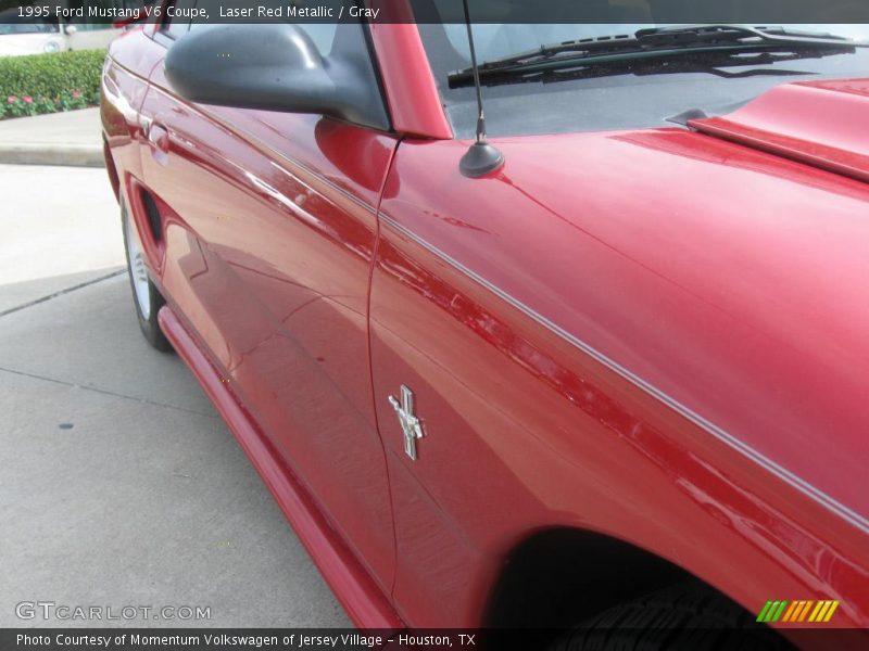 Laser Red Metallic / Gray 1995 Ford Mustang V6 Coupe