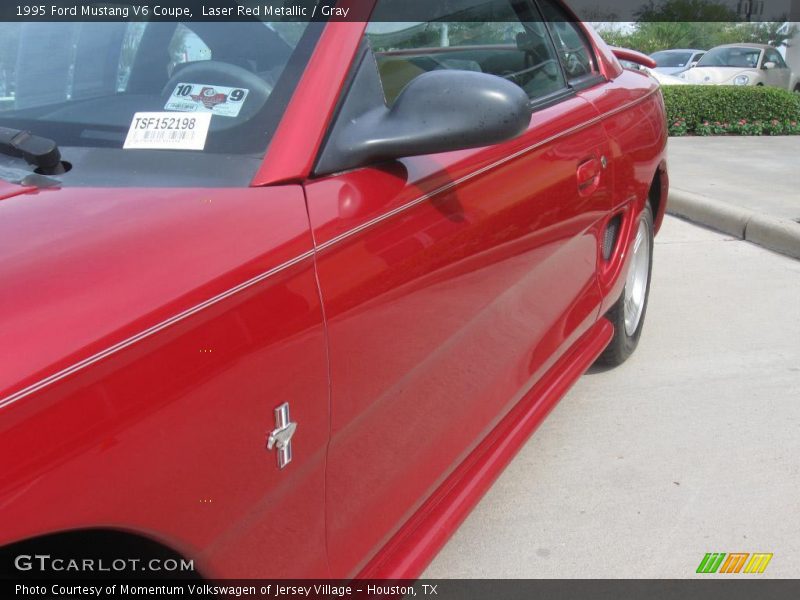 Laser Red Metallic / Gray 1995 Ford Mustang V6 Coupe